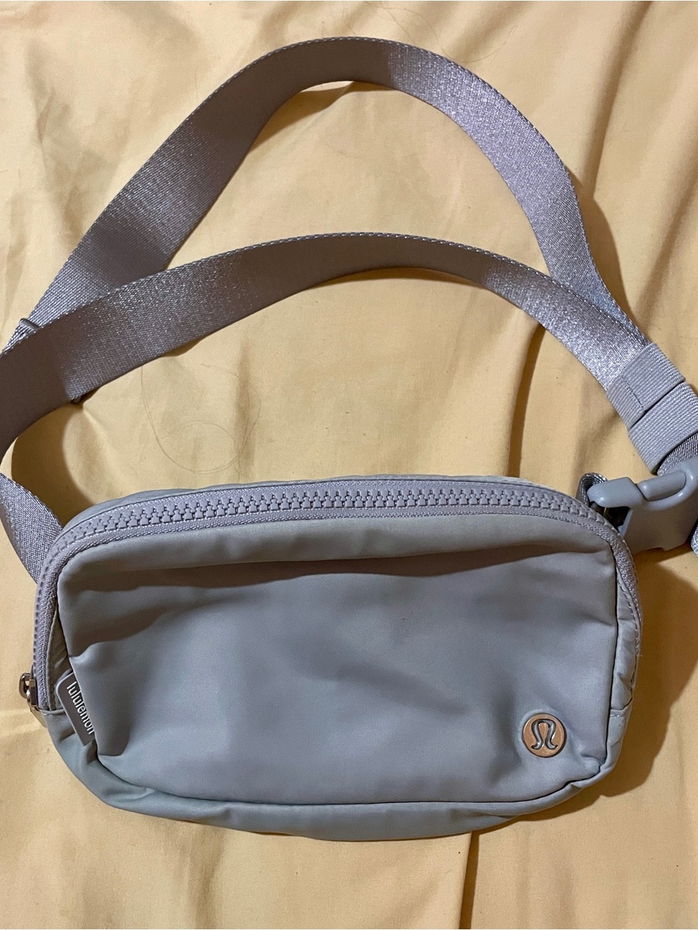 Lululemon Women's Everyday Belt Bag - Colorway is Silver Drop.